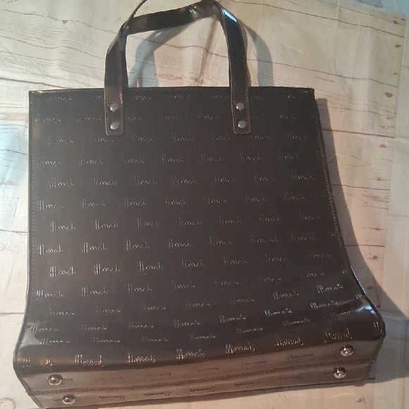 Handbags - Glossy Black Tote Bag with Subtle Logo Pattern